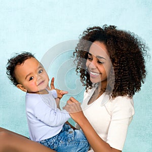 Mother playing with one year old