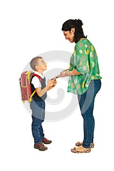 Mother prepare boy for school photo