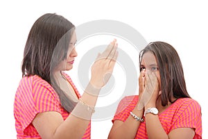 Mother preparing to slap her daughter in the face