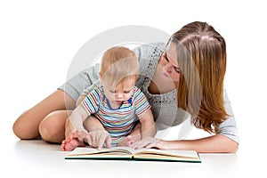 Mother reading book her baby boy