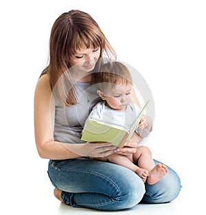 Mother reading a book to her baby boy