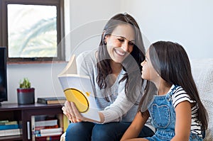 Mother reading to child