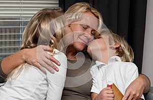 Mother reading to children