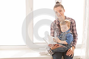 Mother reading to her child an interesting story