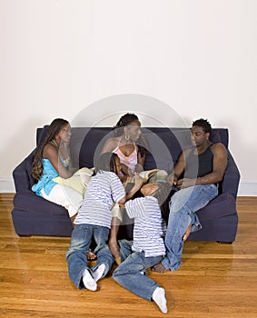 Mother reading to her kids