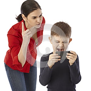 Mother rebuking naughty little boy