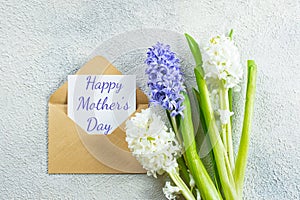 Mother`s day Holiday Concept. Hyacinths, greeting card on light background. Spring Greeting card