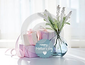 Mother\'s day holiday greeting card, vase and gift boxes