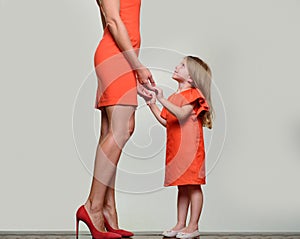 Mother`s day. Kids care concept. Relationship of mother and daughter. Child support. Little girl growing, mom love.