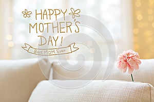 Mother`s Day message with flower in interior room sofa