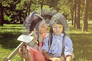 Mother's day, mom and son playing pilots, dreams of a son