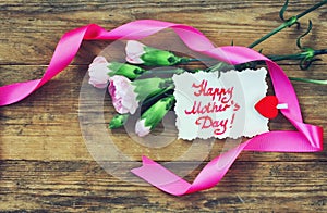 Mother`s Day postcard, pink carnations and note