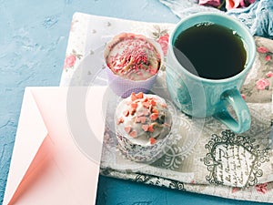 Mother`s day Valentine concept muffins cup tea envelope