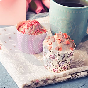 Mother`s day Valentine concept muffins cup tea envelope