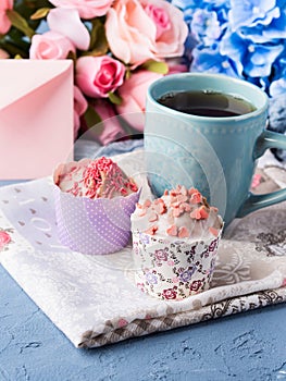 Mother`s day Valentine concept muffins cup tea envelope