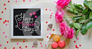 Mother`s Day vintage composition of white photo frame with greeting quote