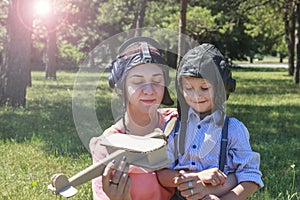 Mother`s Day, World Children`s Day, Mom and Son playing pilots