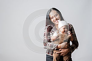 Mother`s Love. Baby smiling. Single mother and her son. Very happy mother and baby