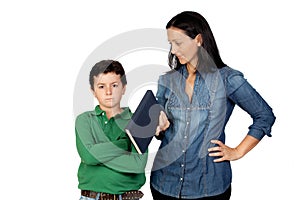 Mother saying his anger child to read a book