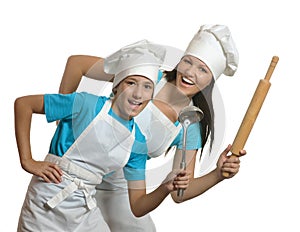 Mother and son in aprons and hats photo