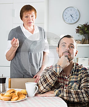 Mother and son arguing