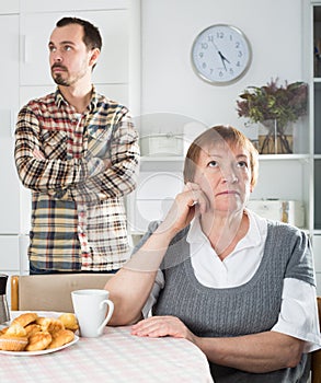 Mother and son arguing