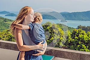 Mother and son in the background of Tropical beach landscape pan