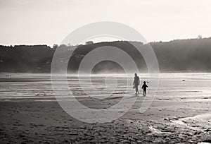 Mother and son on the beach