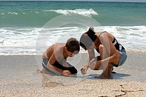 Mother and son on beach