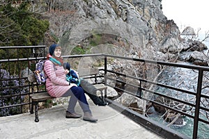 Mother with son on bench at Chekhov`s dacha