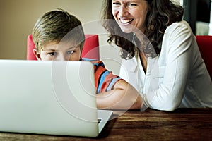 Mother Son Care Communication Laptop Concept