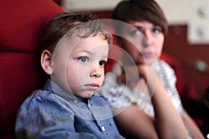 Mother with son in the cinema