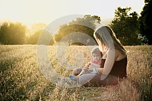 Mother and son at a crop field