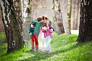 Mother with son and daughter in woods