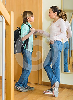 Mother with son at doorway