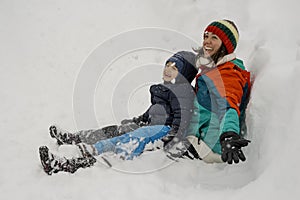 Mother and Son Enjoying First Snow