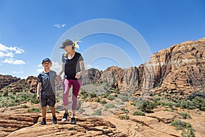 Mother and son exploring some amazing rock formations in southern Utah
