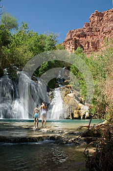 Mother and Son in front of Navajo Falls in Havasu, Arizona