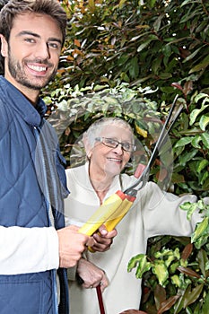 Mother and son gardening