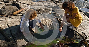 Mother and son having fun together at beach