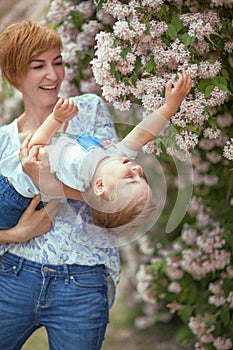 Mother and son having fun together, giggle, happy and smiling