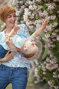 Mother and son having fun together, giggle, happy and smiling photo