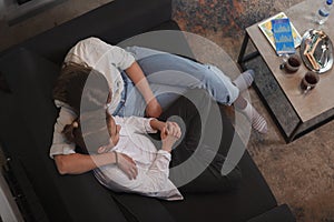 Mother and son in a hotel room