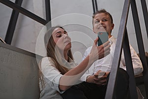 Mother and son in a hotel room