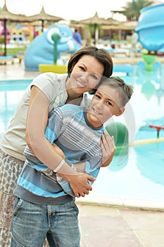 Mother and son near pool