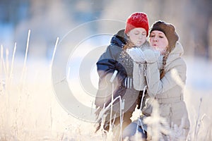 Mother and son outdoors at winter