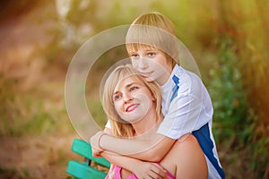 Mother and son in park