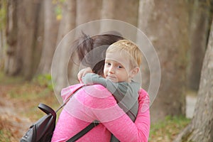 Mother and son in the Park and enjoying the beautiful autumn nature.Concept mum and son, childhood, happy life