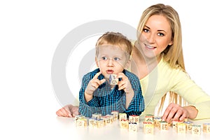 Mother and Son Playing with Blocks