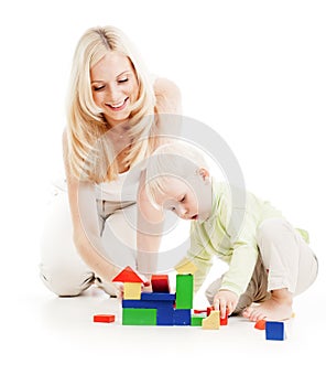 Mother and son playing building blocks together